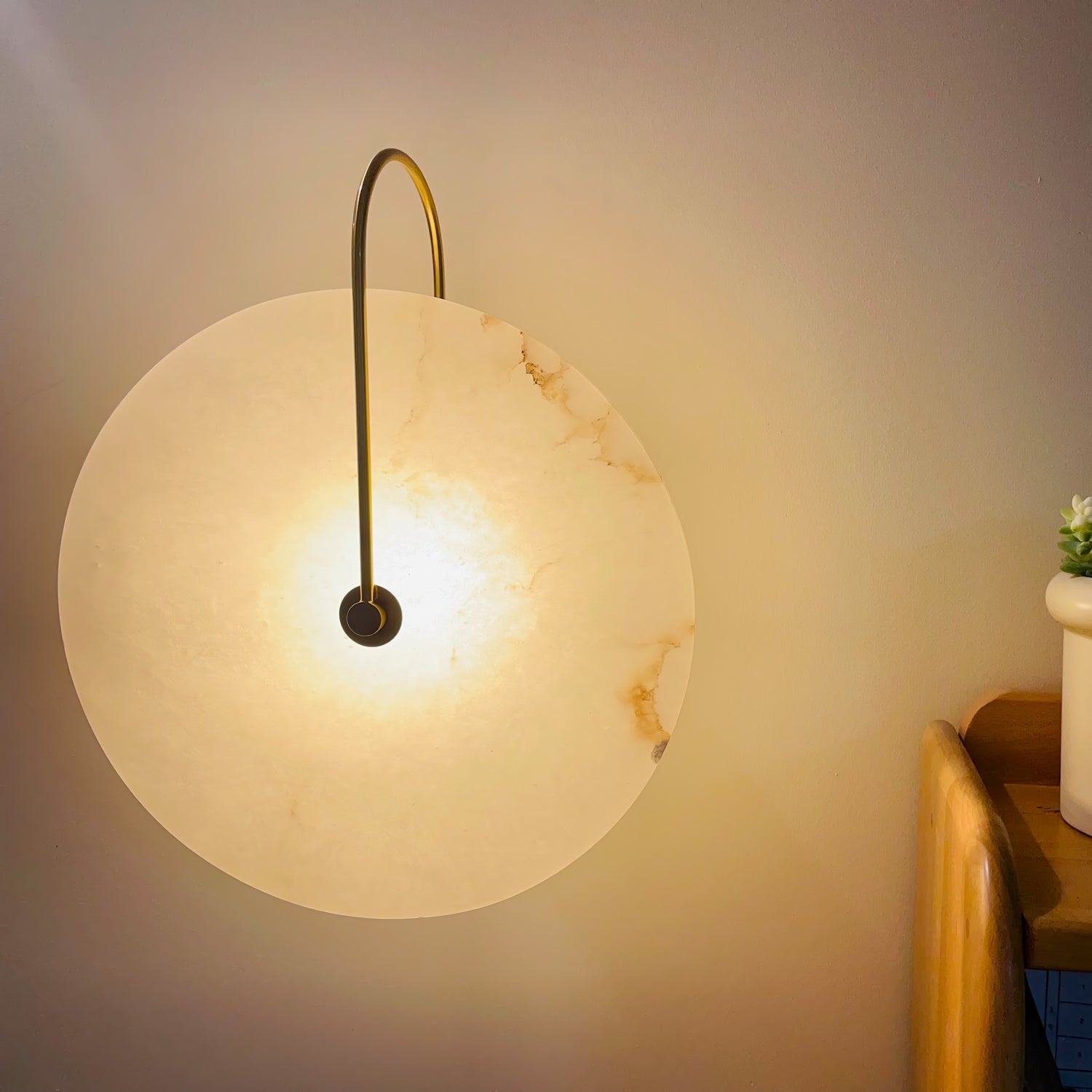 CelesteLume Alabaster LED Disc Sconce with Black Arm - OpalDwell