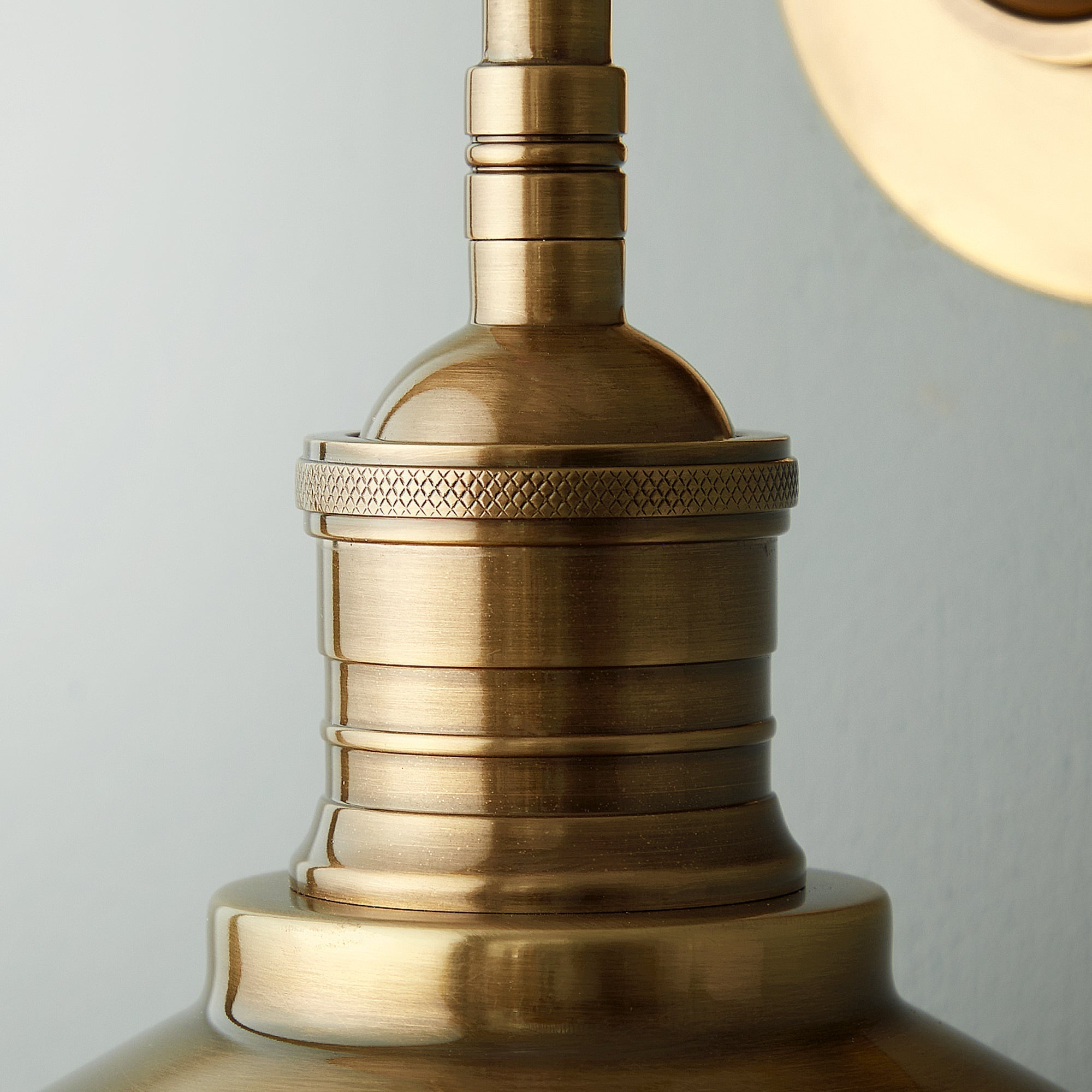 Lyra Antique Brass Wall Lamp With Cone Shade Exposed Bulb - OpalDwell