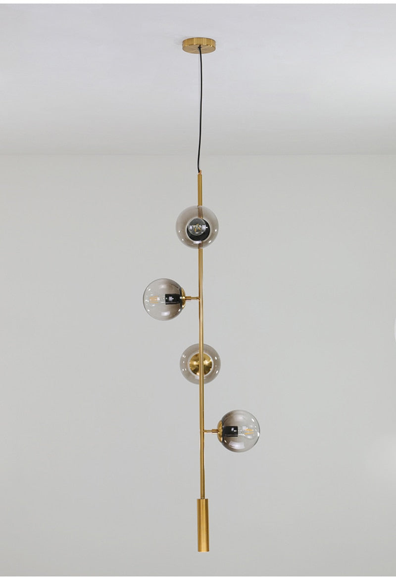Solara Six-Sphere Amber Glass Pendant Light with Gold Rods - OpalDwell