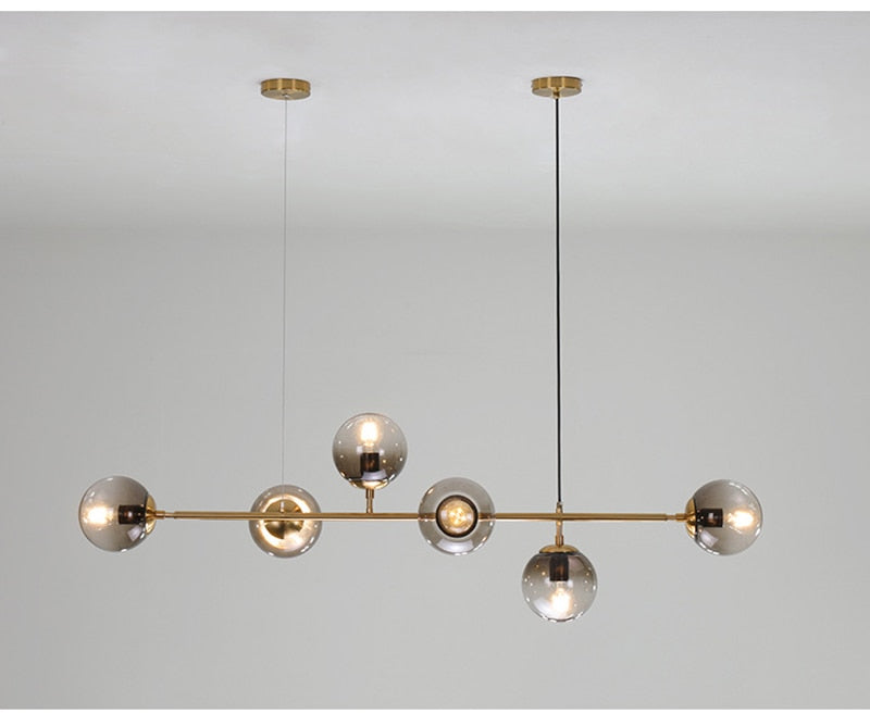 Solara Six-Sphere Amber Glass Pendant Light with Gold Rods - OpalDwell
