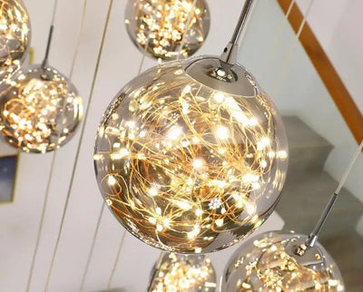 LuminaOrb Glass Orb Staircase Chandelier With Soft Ambient Glow - OpalDwell