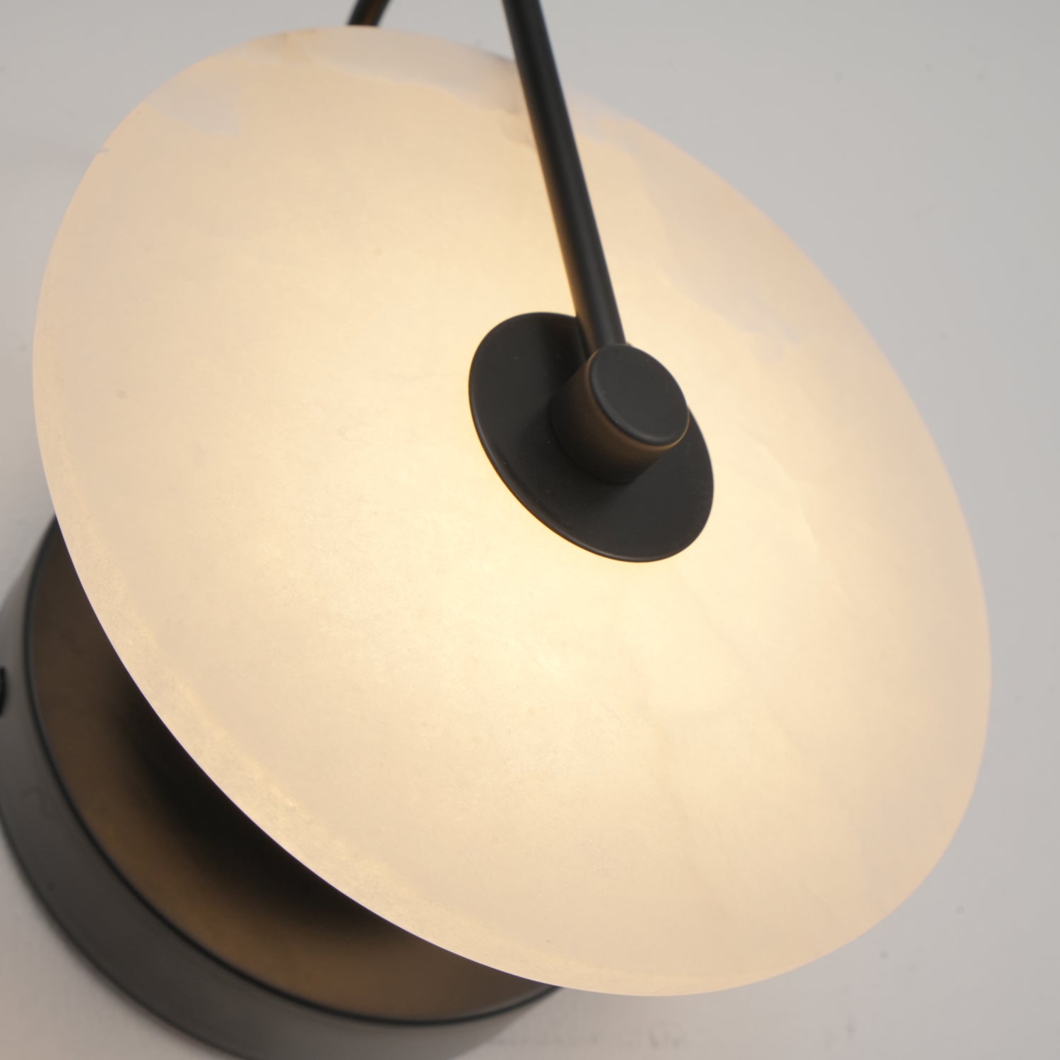 CelesteLume Alabaster LED Disc Sconce with Black Arm - OpalDwell