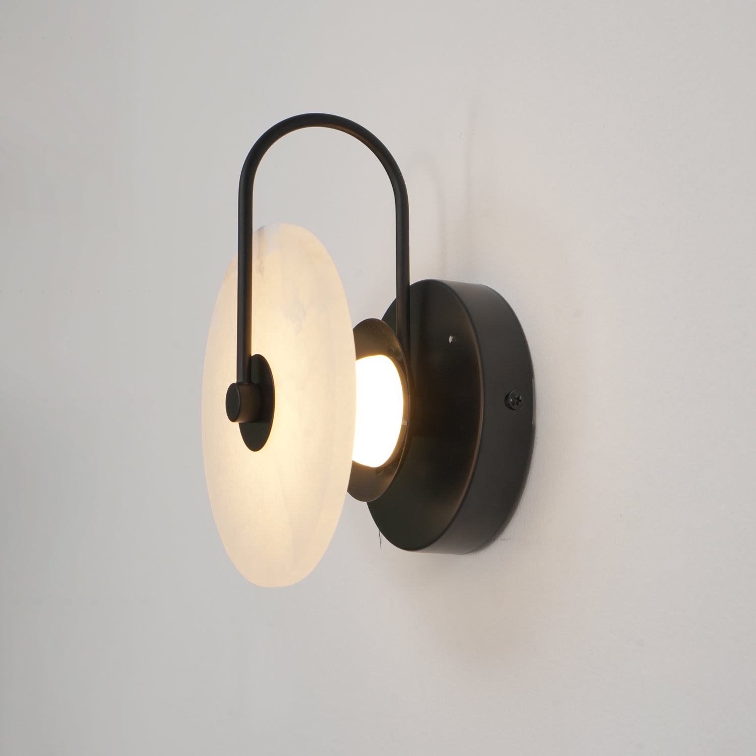 CelesteLume Alabaster LED Disc Sconce with Black Arm - OpalDwell