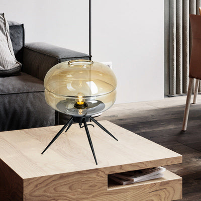 Lyra Smoked Glass Table Lamp With Modern Tripod Design - OpalDwell