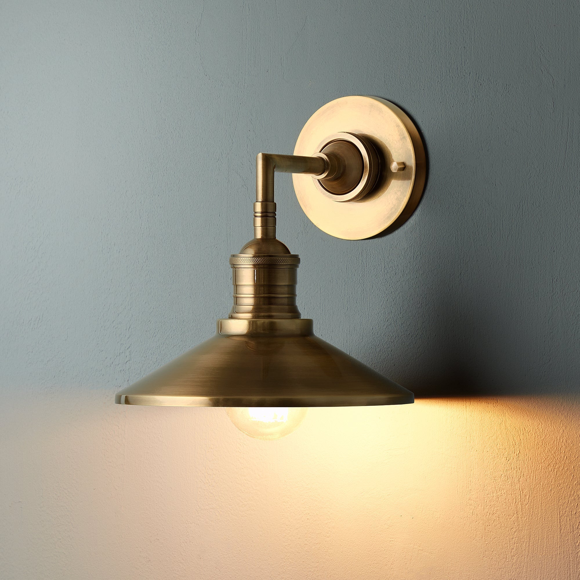 Lyra Antique Brass Wall Lamp With Cone Shade Exposed Bulb - OpalDwell