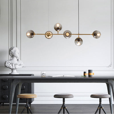Solara Six-Sphere Amber Glass Pendant Light with Gold Rods - OpalDwell