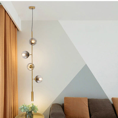 Solara Six-Sphere Amber Glass Pendant Light with Gold Rods - OpalDwell