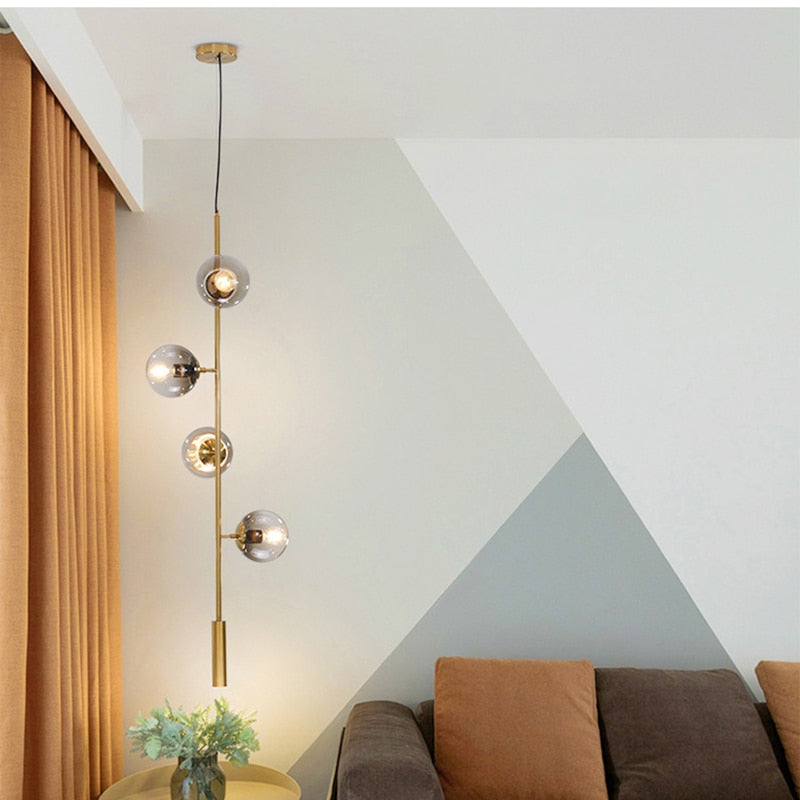 Solara Six-Sphere Amber Glass Pendant Light with Gold Rods - OpalDwell