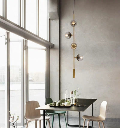 Solara Six-Sphere Amber Glass Pendant Light with Gold Rods - OpalDwell