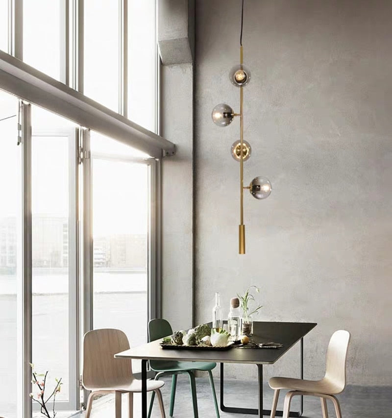 Solara Six-Sphere Amber Glass Pendant Light with Gold Rods - OpalDwell