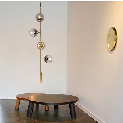 Solara Six-Sphere Amber Glass Pendant Light with Gold Rods - OpalDwell