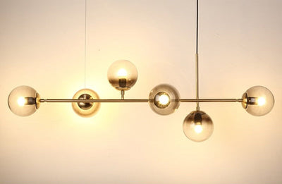 Solara Six-Sphere Amber Glass Pendant Light with Gold Rods - OpalDwell