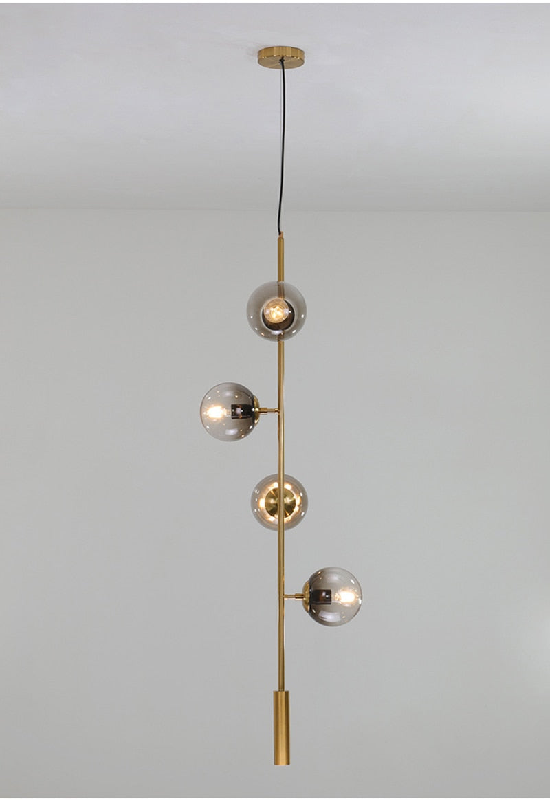Solara Six-Sphere Amber Glass Pendant Light with Gold Rods - OpalDwell